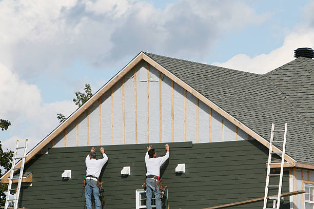 Professional Siding Installation technician working in Boxford, MA